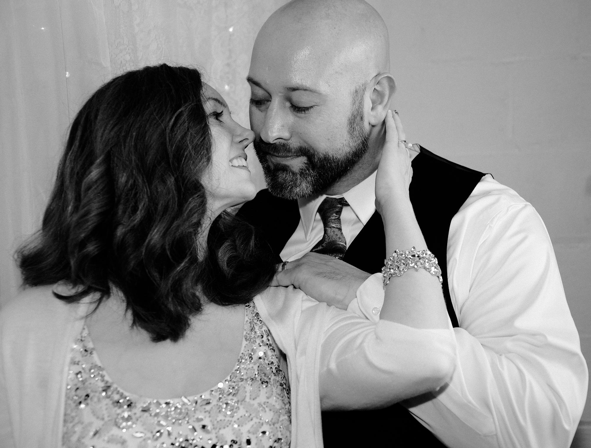 bride and groom about to kiss at their DIY wedding in Erie, PA