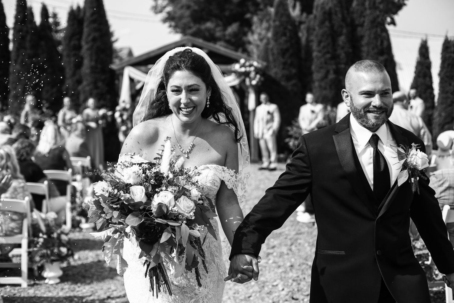 Recessional photo at the end of a wedding at Port Farms